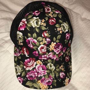 Black hat with bright beautiful roses all over